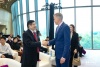 BTG Group Chairman, Bai Fan, shakes hands with UIPM President Rob Stull after the launch press conference in Beijing